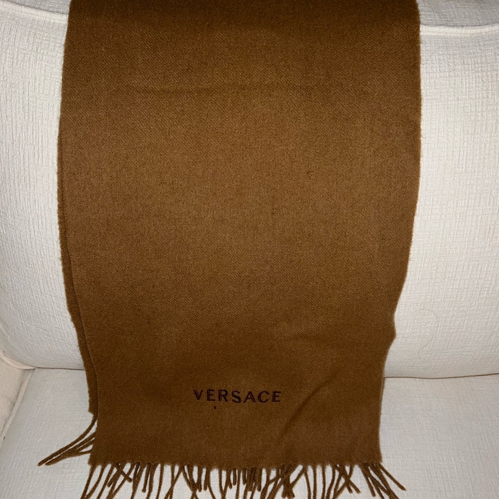 The classic camel hue Versace scarf.